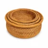 Round Nesting Rattan Baskets | Set of 3 3 round nesting rattan baskets on a white background