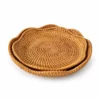 Scalloped Rattan Plates | 2 Sizes 3 scalloped rattan plates on a white background