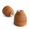 bell shaped rattan vases on a white background