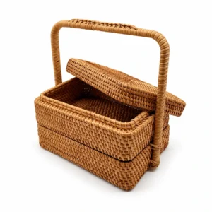rectangular rattan picnic basket on a white background