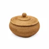 domed lid rattan bowl on a white background