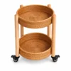 rattan serving trolley on a white background