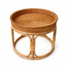 round rattan side table on a white background