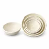 white coiled rattan bowls on a white background