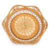 hexagonal openwork rattan plates on a white background