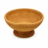 pedestal rattan fruit bowl on a white background