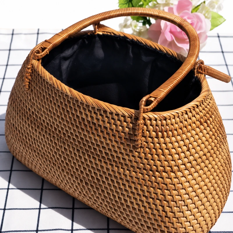 Lined Rattan Handbag | 2 Sizes 2 lined rattan handbag construction and carrying detail